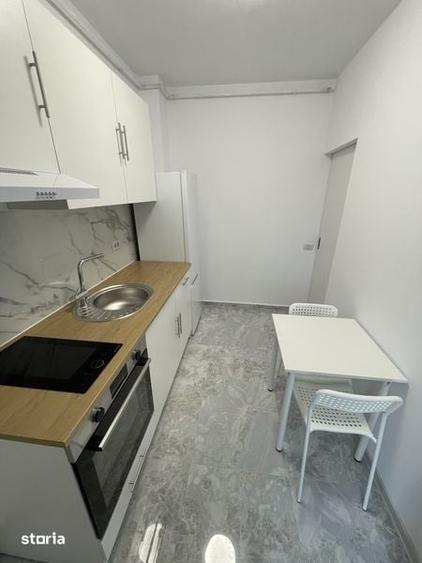Garsoniera in bloc nou - 8
