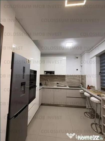 Apartament cu 3 camere decomandat în Tractorul