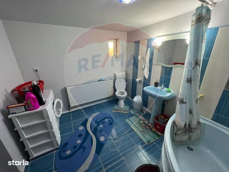 Casă cu 4 camere cu Teren 899 Mp în Grebănu