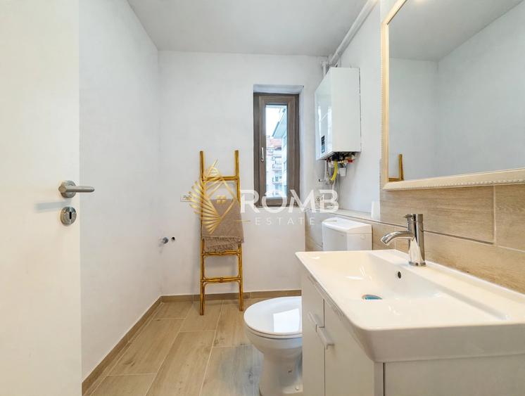 Apartament cu 3 camere semidecomandat, mobilat în Borhanci