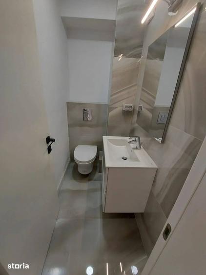 Apartament cu 3 camere decomandat în Polonă