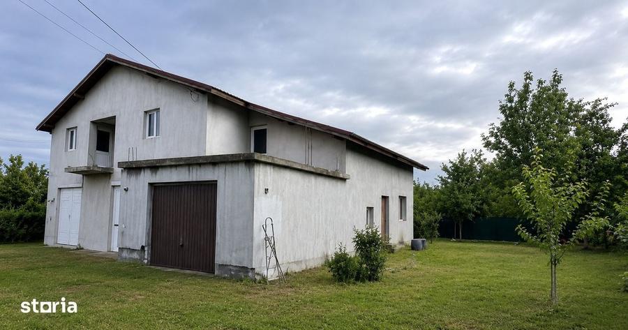 Casă cu 4 camere în Butimanu