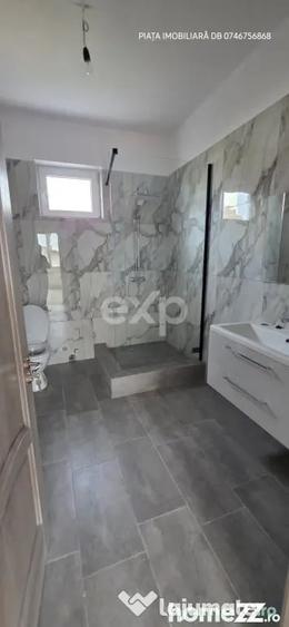Casă cu 8 camere cu Teren 1388 Mp în Voinești