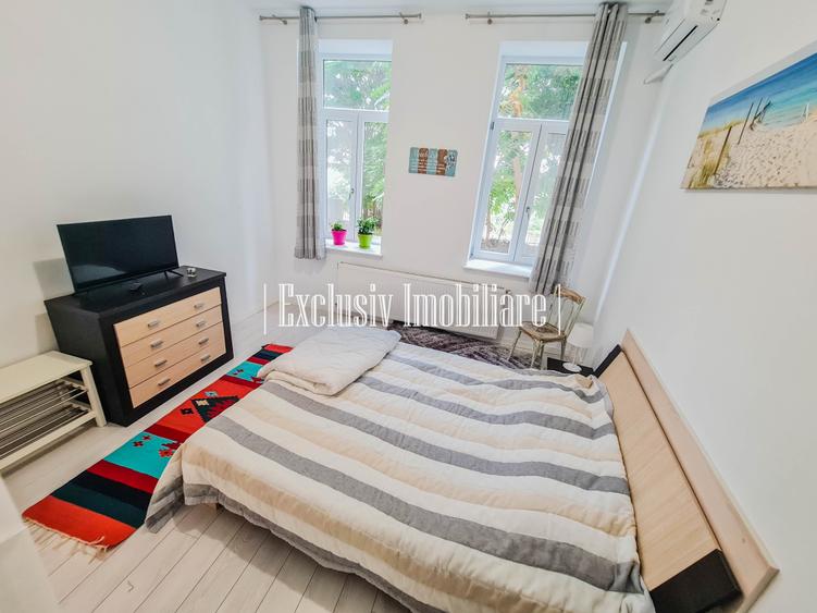 Apartament cu 3 camere semidecomandat, mobilat în Central