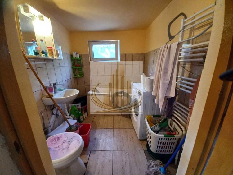 Casă individuală cu 3 camere cu Canalizare în Plopi