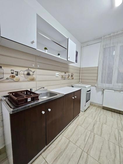 Apartament cu 2 camere semidecomandat, mobilat în Central