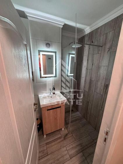 Apartament cu 3 camere semidecomandat, mobilat în Bucovina
