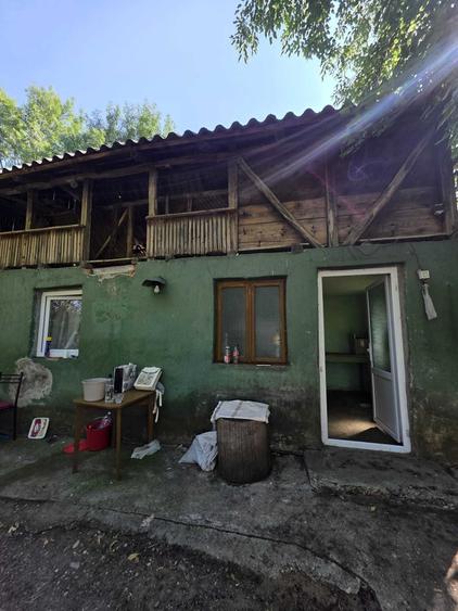 Casă cu 4 camere în Băleasa