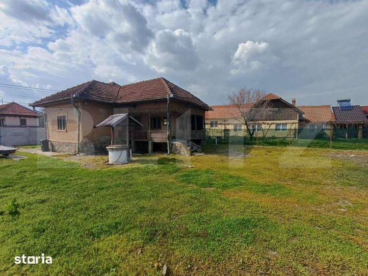 Casă cu 3 camere cu Teren 1000 Mp în Arcani