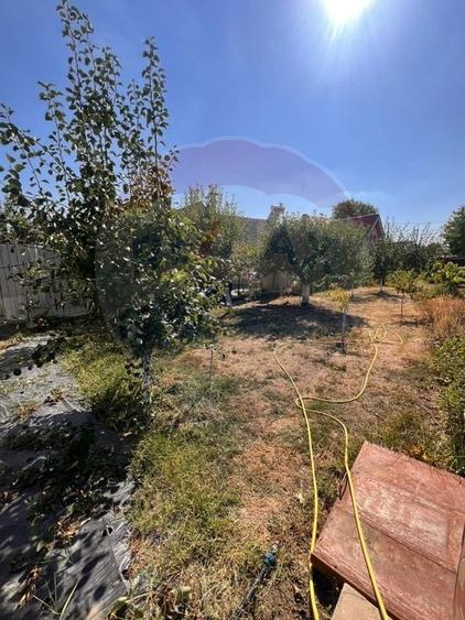 Casă cu 4 camere cu Teren 1000 Mp în Central