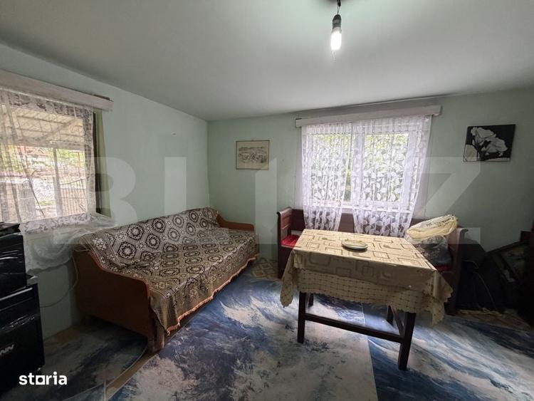 Casa cu 3 camere si un teren de 1500 - 1