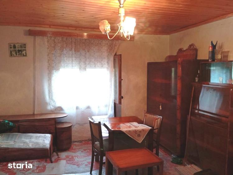 Casă cu 4 camere cu Teren 1200 Mp în Buteni