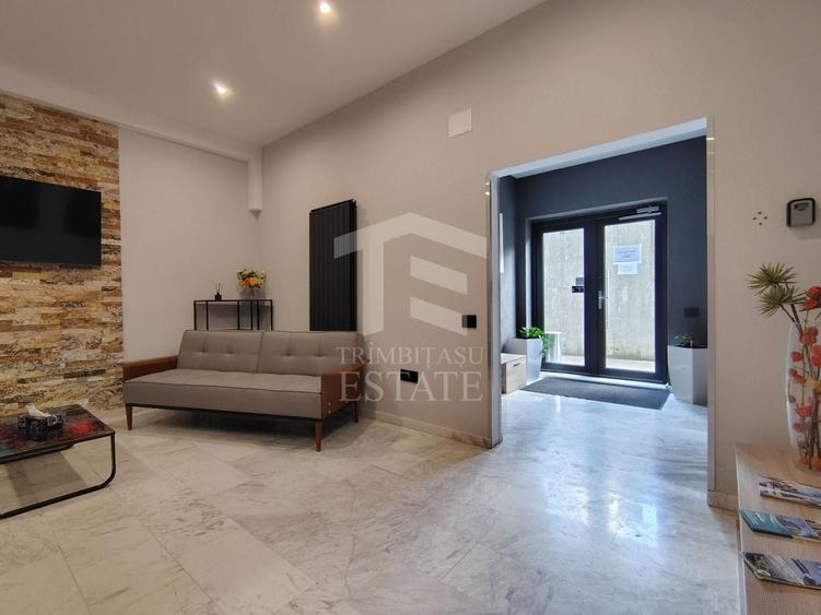 Apartament cu 2 camere semidecomandat, mobilat în Central