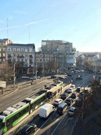 Apartament cu 4 camere decomandat în Central