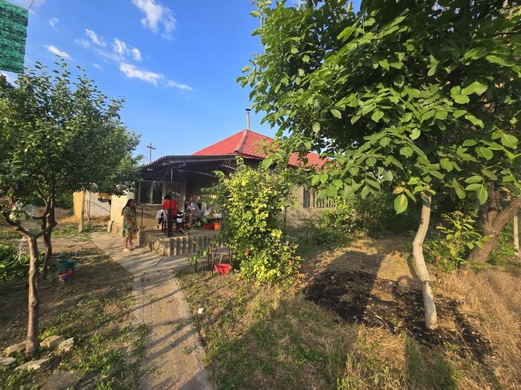 Casă cu 4 camere în Traian