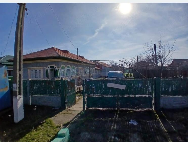 Casă cu Teren 1400 Mp în Poenari
