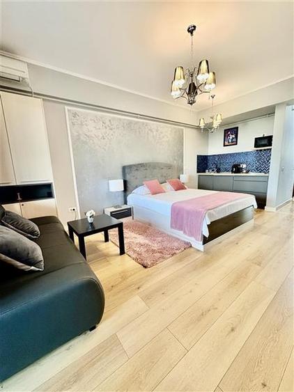 Apartament cu 2 camere decomandat, mobilat în Central