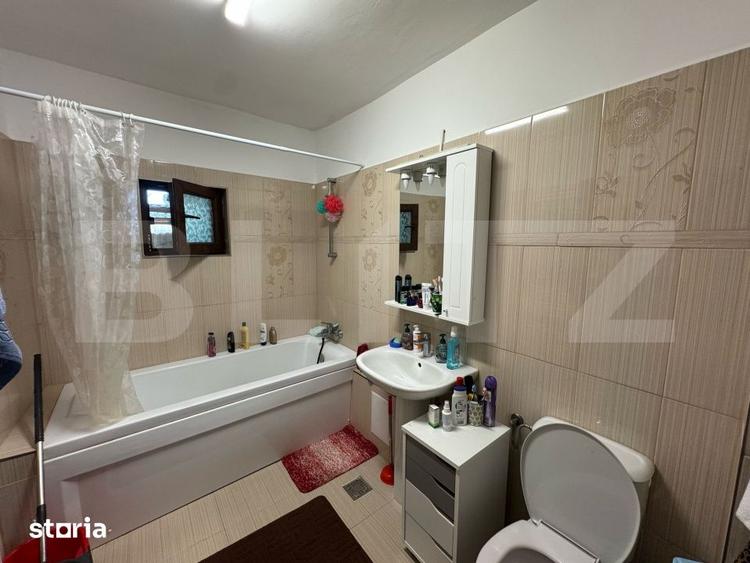 Casă cu 6 camere cu Teren 1000 Mp în Sântuhalm