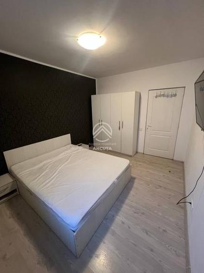 Apartament cu 3 camere semidecomandat în Tăuți
