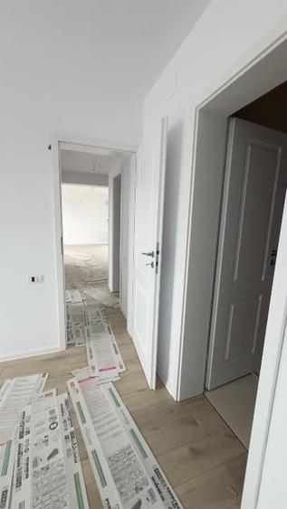 Apartament cu 3 camere decomandat în 2 Moldoveni