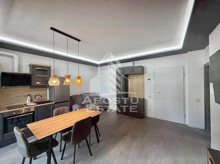 Apartament cu 2 camere semidecomandat, mobilat în Torontalului