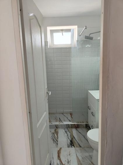 Apartament cu 3 camere semidecomandat în Faleza Nord