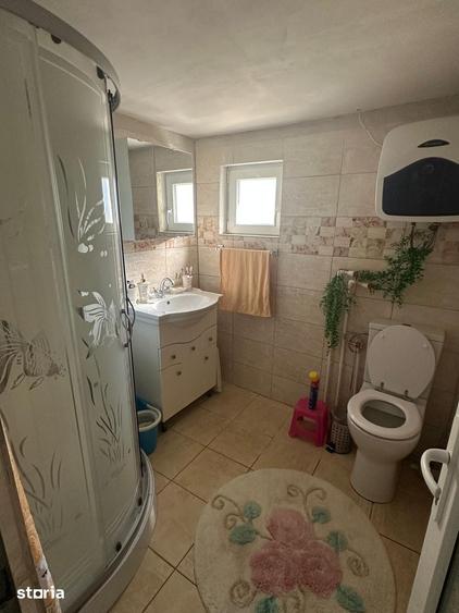 Casă cu 4 camere cu Teren 1000 Mp în Buturugeni