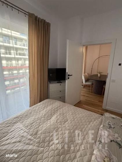 Apartament cu 2 camere, mobilat în Central — fotografia 3