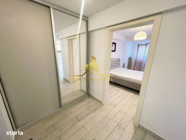 Apartament cu 3 camere semidecomandat, mobilat în Borhanci