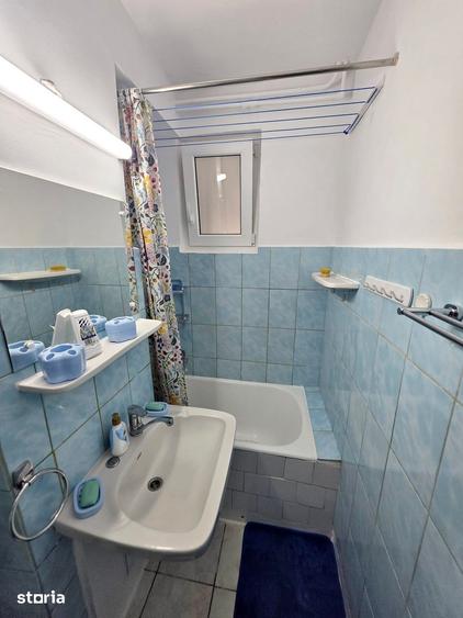 Garsonieră decomandată în Titan