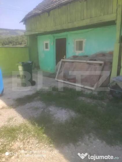 Casa 2 camere, 124mp utili, teren imprejmuit 3500mp, comuna - 10