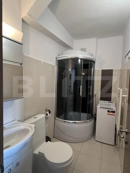 Apartament cu 2 camere semidecomandat, mobilat în Central