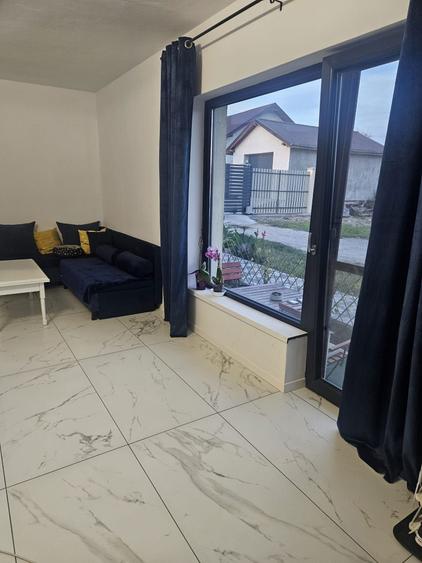 Apartament cu 2 camere decomandat în Crișeni