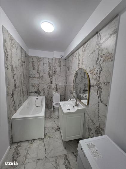 Apartament cu 3 camere semidecomandat în 1 Decembrie