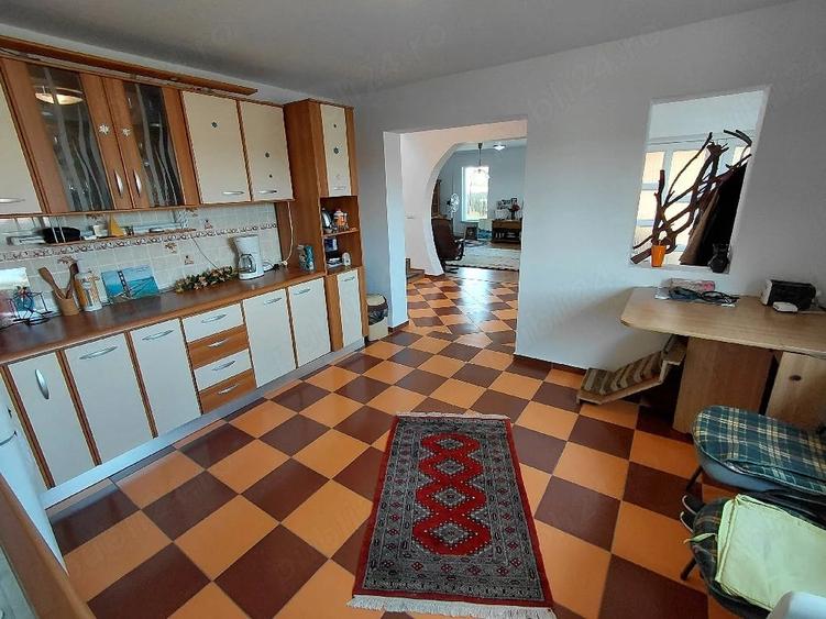 Casă cu Teren 1062 Mp în Oituz