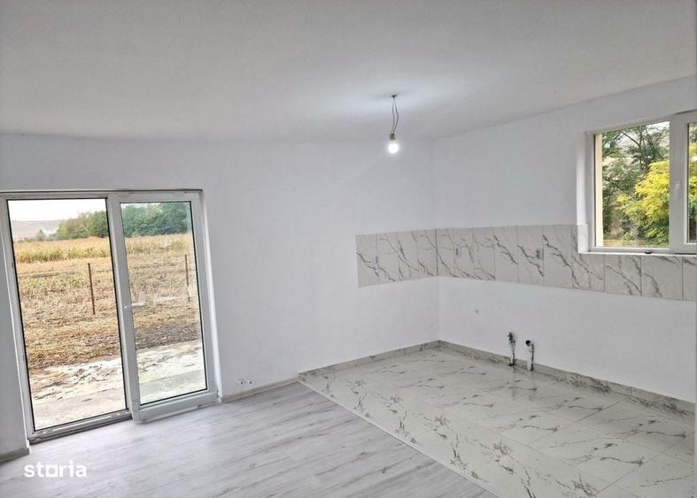 Casă cu 4 camere în Căianu