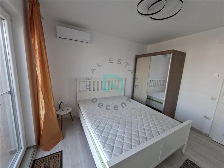 Apartament cu 4 camere decomandat în Tractorul