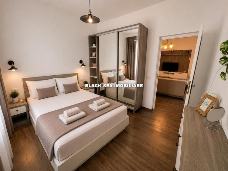 Apartament cu 2 camere, mobilat în Faleza Nord