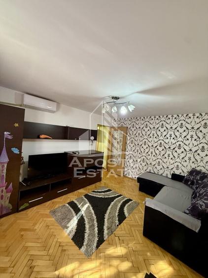 Apartament cu 2 camere semidecomandat, mobilat în Dâmbovița