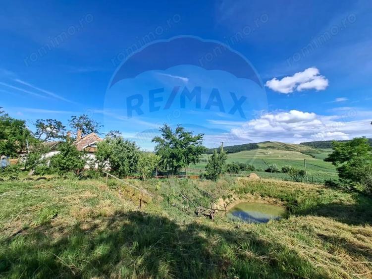 Casă cu 3 camere cu Teren 5800 Mp în Lechința