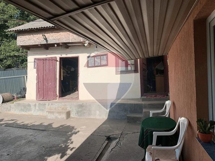 Casă cu Teren 1043 Mp în Dochia