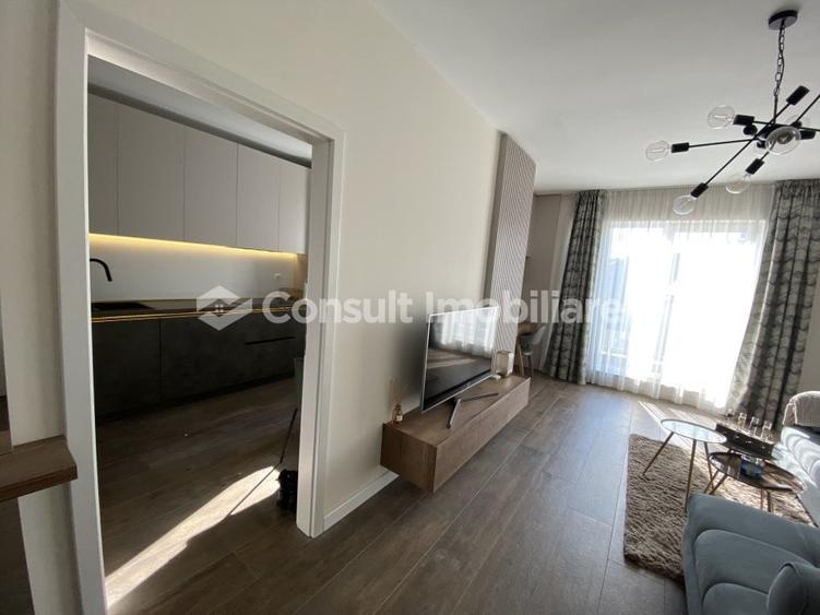 Apartament cu 2 camere semidecomandat, mobilat în Chinteni