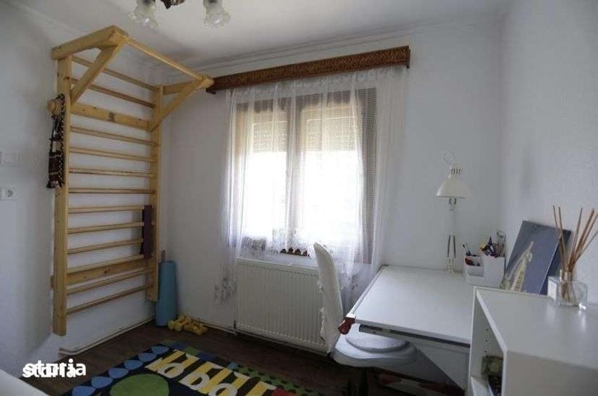 Casă cu 4 camere cu Teren 1400 Mp în Răucești