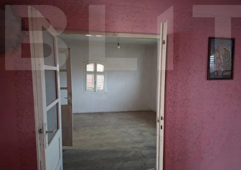 Casă cu 4 camere cu Teren 1000 Mp în Central