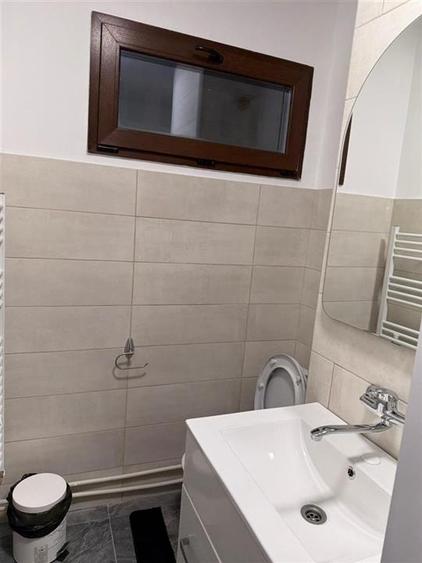 Apartament cu 2 camere semidecomandat, mobilat în Podu Roș