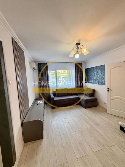 Apartament cu 2 camere semidecomandat, mobilat în Podu Roș