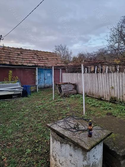 Casă cu 2 camere cu Teren 900 Mp în Cozia