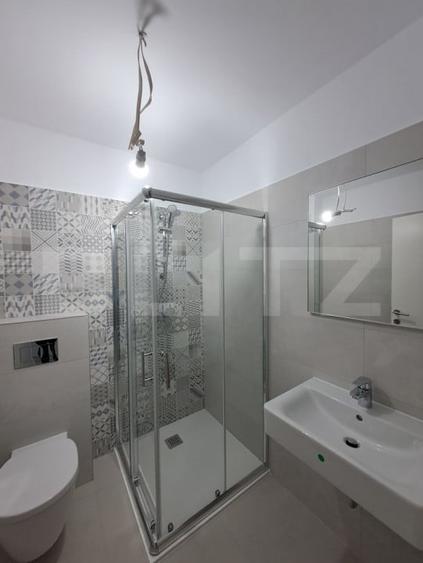 Apartament cu 3 camere decomandat în Tractorul