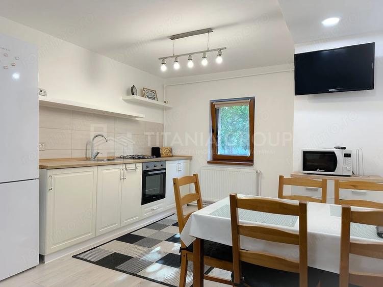 Apartament cu 3 camere decomandat în Tractorul