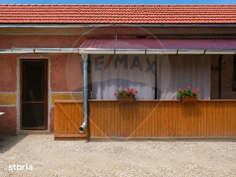 Casă cu 4 camere cu Teren 1150 Mp în Romos
